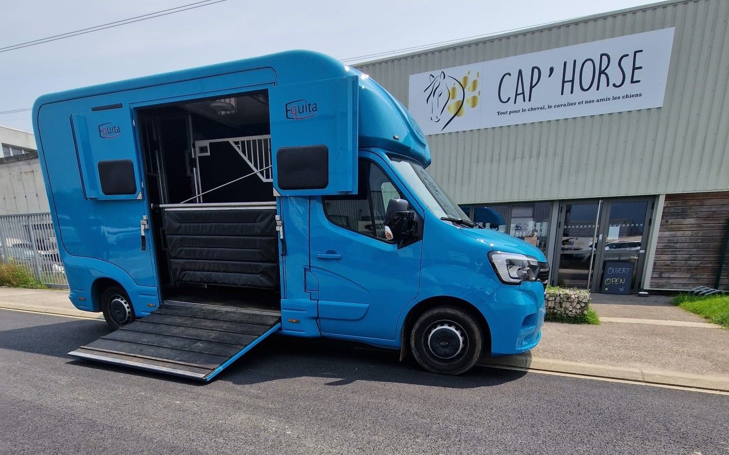 Transport truck for horses in front of the Cap Horse in Ornex store, Pays de Gex